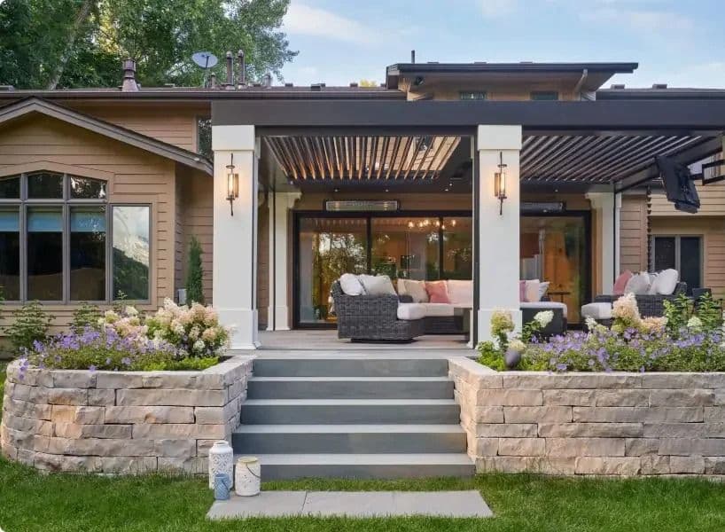 house with black metal pergolas